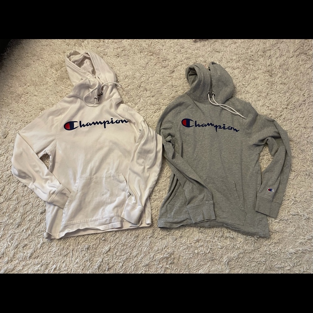 Two men hoodies. Grey one in good condition. White hoodie has some stain spots
